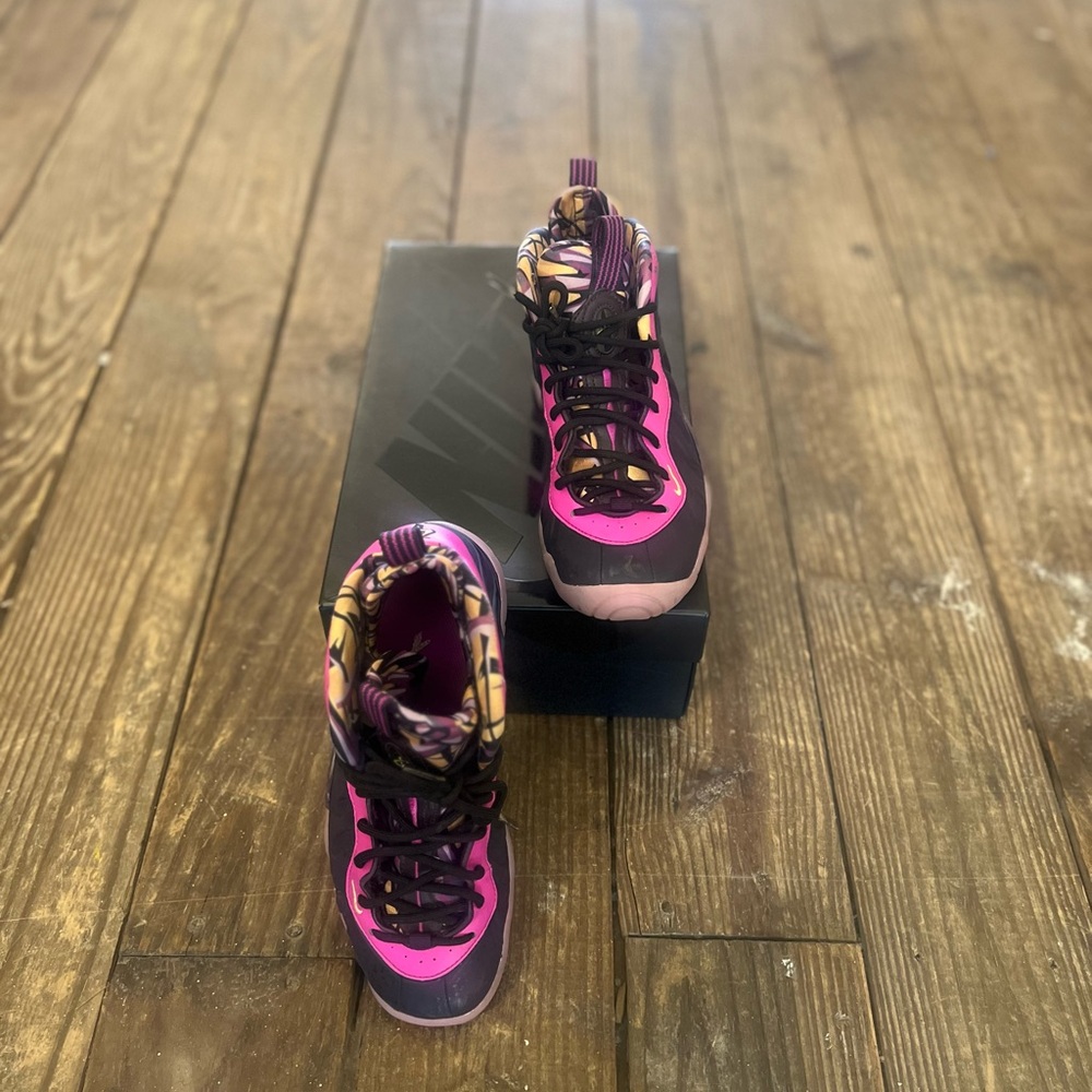 Nike Kids Sneakers - Pink and Purple in great condition. Has a few blemishes.